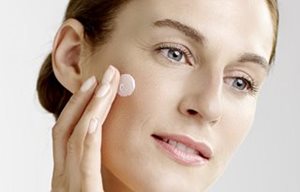 Woman uses cream