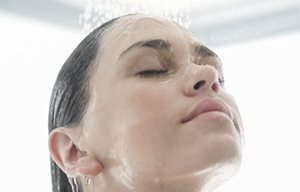 Woman taking shower.